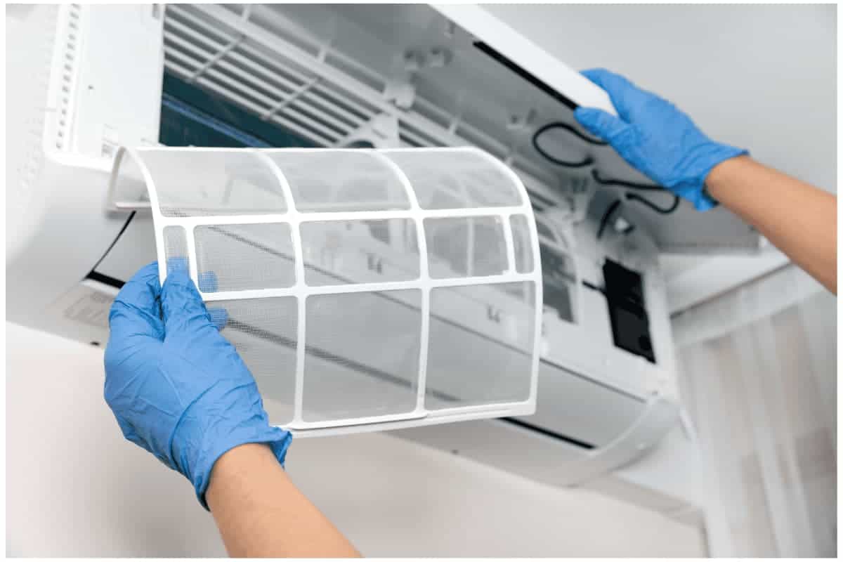 air conditioner mini-split service being performed