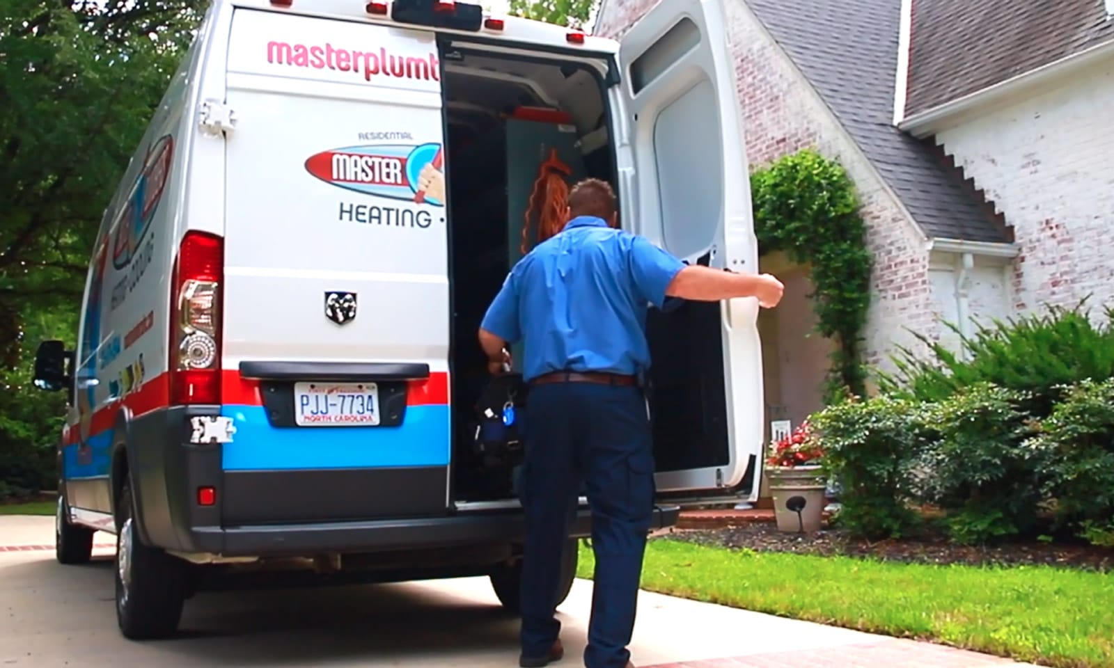 a man riding on the back of a truck